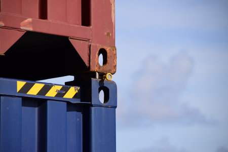 Containers stacked one on another. Twistolck used for securing.の写真素材