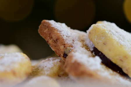 Delicious home made cookies with almonds, covered with powder sugar, star shaped.の写真素材