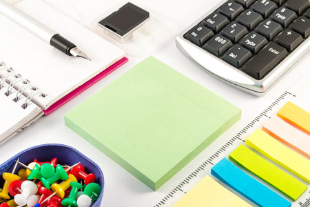 Office supplies on white background