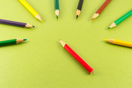 color pencils on green backgroundの写真素材