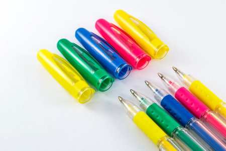 Color pens on white background