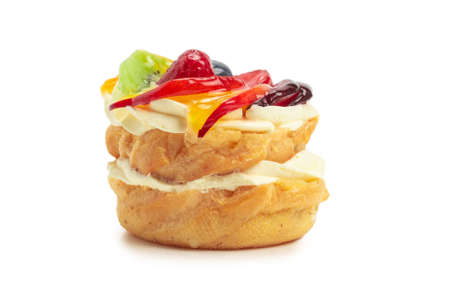 Home made cake with cream and fruit isolatedの写真素材