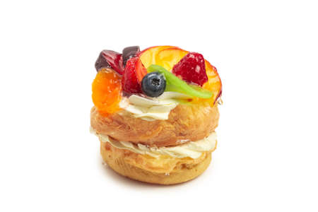 Home made cake with cream and fruit isolatedの写真素材