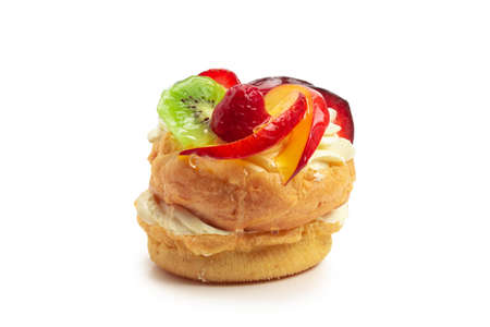 Home made cake with cream and fruit isolatedの写真素材