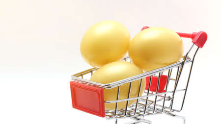 easter eggs in cart for giftの写真素材
