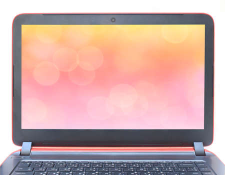laptop with colorful circles of light abstract backgroundの写真素材