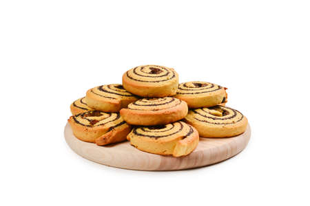 Baked cookies with raisins and poppy seeds isolated on white background.の写真素材