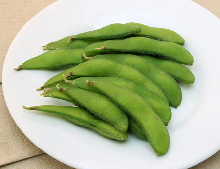 Edamame soy beans in dishの写真素材