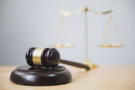 Law and justice, legality concept, Judge gavel on wooden tableの写真素材