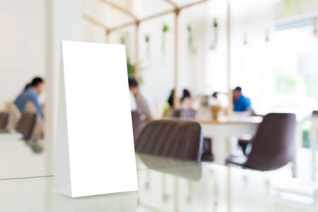 Mock up blank template menu frame in restaurant with blurred background, Clipping path includedの写真素材