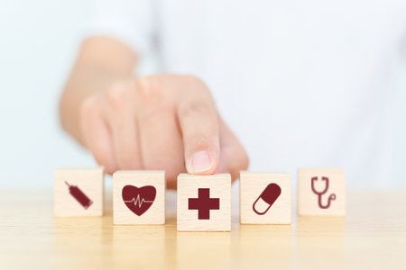 Wood block with icon healthcare medical, Insurance for your health conceptの写真素材