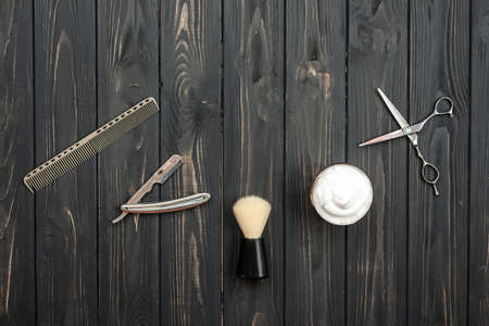 Shaving accessories on a wooden texture background. Tools. Shaving, brush, foam hazard razor.の写真素材