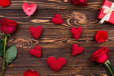 Handmade hearts laid out on a wooden surfaceの写真素材