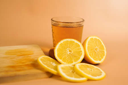a cup of tea decorated with sliced oranges aroundの写真素材