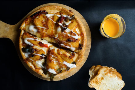 a tempting pizza on the wooden peel