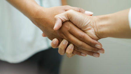 hands shaking each other usually done