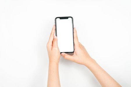 holding a smartphone an white background