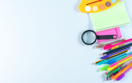 pens and pencils with notebooks