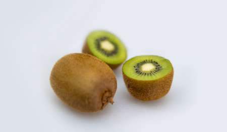 slices of kiwi fruit arranged to be photographed freshの写真素材