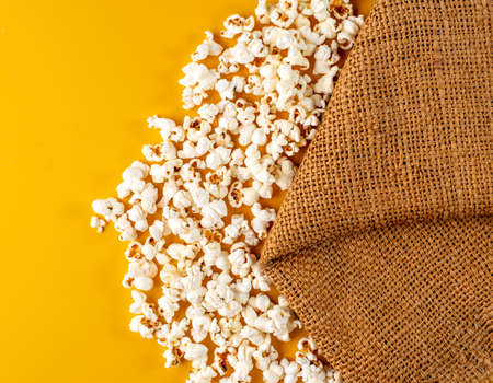 popcorn on yellow backgroundの写真素材