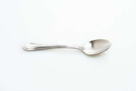 silver spoon on white backgroundの写真素材