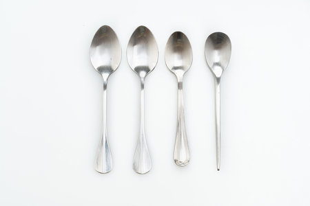 silver spoon on white background
