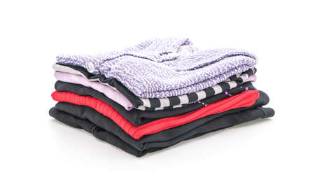 stacks of clothing on whiteの写真素材