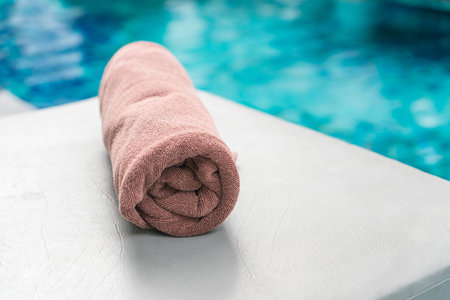 Pool towel on chair decoration around swimming poolの写真素材