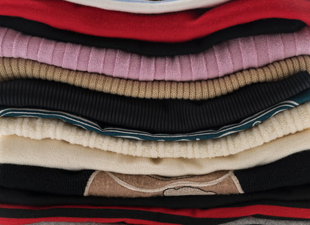 stacks of clothing on white