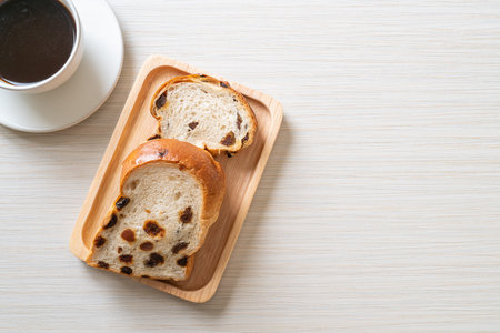 raisin bread with coffee cupの写真素材