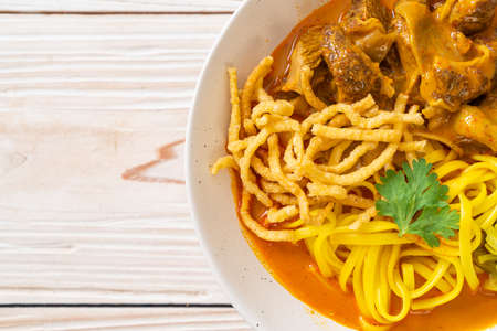 Northern Thai noodle curry soup with braised porkの写真素材