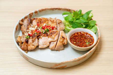 savoury grilled chicken with chilli and garlicの写真素材