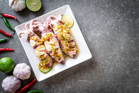 Steamed Squids with Spicy Chili and Lemon Sauceの写真素材
