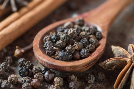Spices and herbs. Food and cuisine ingredients. Cinnamon sticks, anise stars, black peppercorns and...
