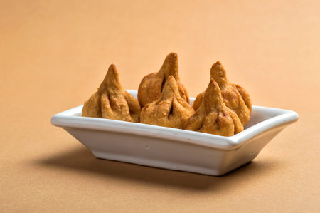 Indian Food: Modak, Maharashtra Sweet Dish, favourite sweet of lord ganesha, greeting card design.