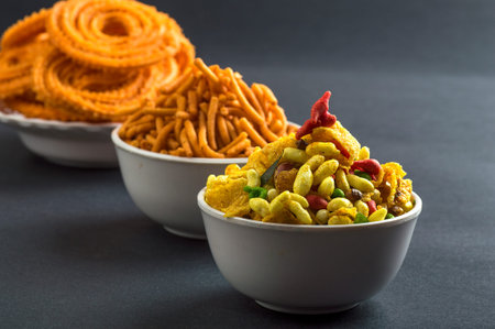 Indian Snack : Chakli, chakali or Murukku and Besan (Gram flour) Sev and chivada or chiwada. Diwali Foodの写真素材