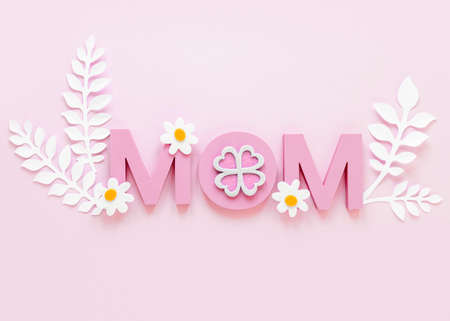 top view mom word pink background. High quality beautiful photo conceptの写真素材