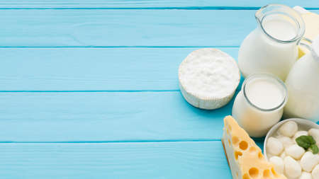 top view variety tasty cheese with milk. High quality beautiful photo conceptの写真素材