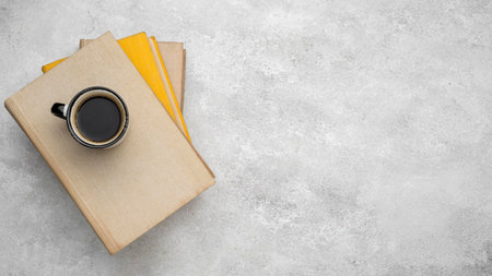 top view hardback books table with coffee copy space. High quality beautiful photo conceptの写真素材