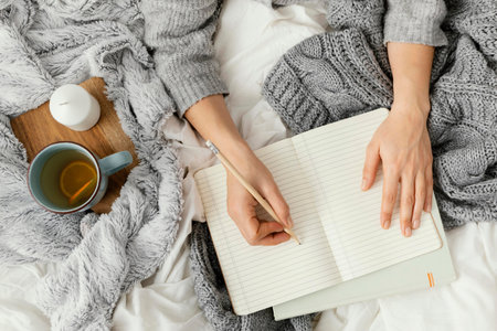 close up woman writing notebook