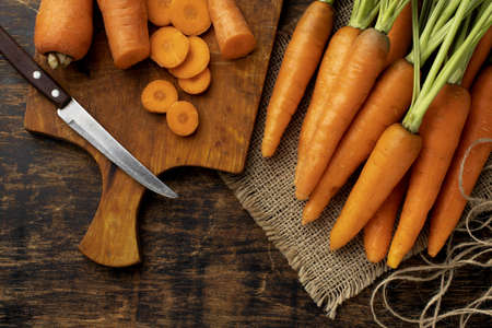 bunch fresh carrots arrangement. High quality and resolution beautiful photo conceptの写真素材