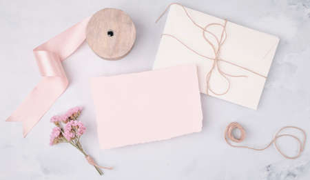 flat lay lovely arrangement with wedding invitationsの写真素材