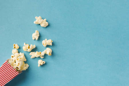 top view popcorn composition blue background with copy space. High quality and resolution beautiful photo conceptの写真素材
