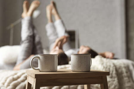 coffee cups table with couple bed. High quality and resolution beautiful photo conceptの写真素材