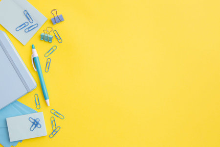 stationary composition yellow background with copy space. High quality and resolution beautiful...