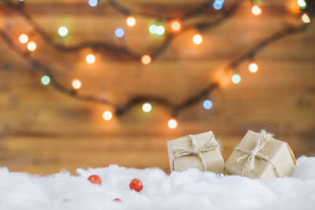 present boxes decorative snow near fairy lights . High quality and resolution beautiful photo conceptの写真素材