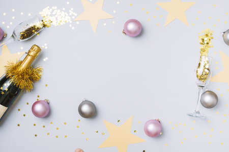 champagne bottle with baubles table. High quality and resolution beautiful photo conceptの写真素材