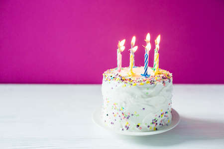 homemade birthday cake with candlesの写真素材