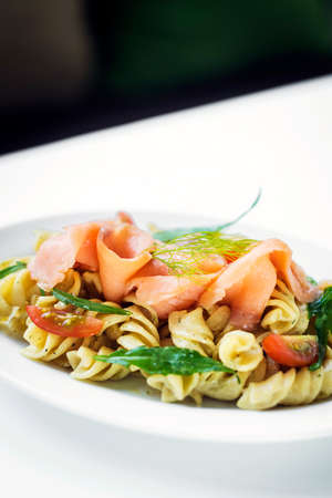 smoked salmon organic tomato and basil fresh pasta saladの写真素材