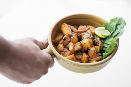 batata harra traditional lebanese spicy fried potato starter dishの写真素材